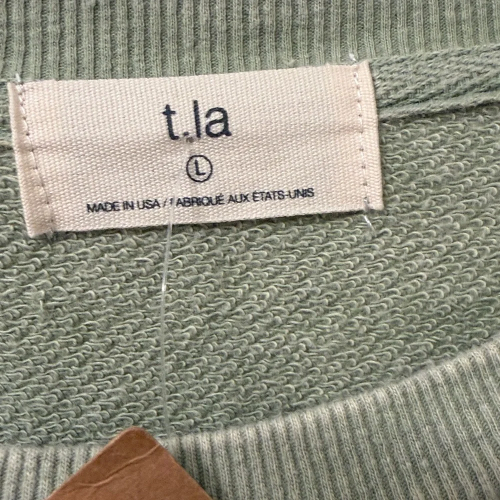 T.LA Anthropologie Green Distressed Ruffle Pullover Sweatshirt size‎ large NWT